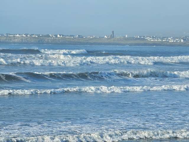 Huge swell all along the beach but the tide too high for surfers